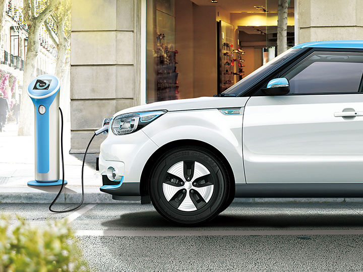 Kia car charging at a public place